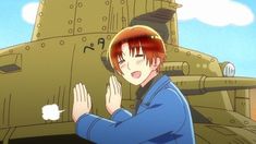 an anime character standing in front of a tank with his hands folded out to pray