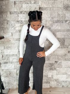 Women's Solid Rib Overall Jumpsuit Time After Time Jumpsuit Introducing our Solid Rib Overall Jumpsuit, a stylish and comfortable piece that effortlessly combines practicality and modern design. Item Details: Solid Rib Fabric: Offers a soft and textured feel for ultimate comfort. Button-In Straps: Allows for an adjustable and secure fit. Side Patch Pockets: Adds a functional and trendy touch for carrying essentials. Wide Leg Design: Ensures a relaxed and flowy silhouette. Overall Style: Classic Casual Bodysuit For Workwear In Winter, Casual Winter Bodysuit For Workwear, Casual Winter Workwear Bodysuit, Gray Jumpsuits And Rompers For Fall Loungewear, Gray Winter Loungewear Jumpsuits And Rompers, Casual Gray Jumpsuits And Rompers For Work, Overall Jumpsuit, Time After Time, Rib Fabric