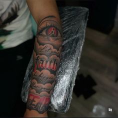 a person with a tattoo on their arm