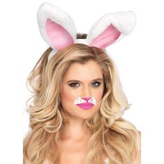 a woman with long blonde hair and bunny ears on her head, wearing pink lipstick