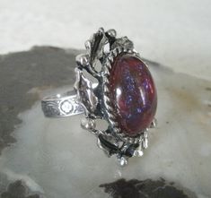 Dragons Breath Fire Opal Ring This beautiful sterling silver plated ring has a glass dragon's breath fire opal setting. Adjustable. Silver Gothic Rings For Formal Occasions, Gothic Oval Collectible Jewelry, Gothic Formal Adjustable Rings, Gothic Adjustable Rings For Formal Occasion, Collectible Gothic Oval Jewelry, Gothic Style Adjustable Rings For Formal Occasions, Adjustable Gothic Style Rings For Formal Occasions, Silver Fantasy Rings For Collectors, Victorian Silver Metal Rings