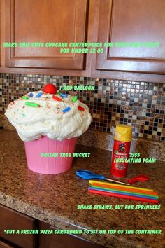 a cupcake sitting on top of a kitchen counter