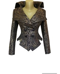 "Formal bronze lace jacket This elegant fitted wedding or formal jacket is made of fine black fabric fully covered with antique gold lace. Double breasted with black satin covered buttons. Suitable for formal day and evening occasions. SIZE CHART SIZE S - US 6, UK 8, EU 36 bust: bust around 34.5\"/90cm Waist: waist around 27.5\"/70cm Hips: hips around 34.5\"/90cm SIZE M - US 8, UK 10, EU 38 bust: bust around 37.5\"/95cm Waist: waist around 29.5\"/75cm Hips: hips around 37.5\"/95cm SIZE L - US 10 Elegant Fitted Blazer With Gold Buttons, Elegant Fitted Outerwear With Gold Buttons, Elegant Party Blazer With Covered Buttons, Elegant Evening Blazer With Covered Buttons, Luxury Evening Blazer With Gold Buttons, Formal Fitted Outerwear With Gold Buttons, Elegant Formal Outerwear With Gold Buttons, Elegant Party Blazer With Buttons, Elegant Fitted Outerwear For Gala