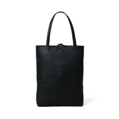 Introducing our Sydney Black Shopper Tote, a timeless fusion of fashion and function. Handcrafted by skilled artisans, this bag embodies exquisite craftsmanship. Crafted from premium full-grain buffalo leather, it exudes both durability and a classic tactile appeal. The secure zipper closure ensures your essentials remain safe, while the well-designed inside pocket accommodates coins, keys, purses, or your phone. Ideal for the office, it's spacious enough to carry your tablet or small laptop, ef Organization Essentials, Small Laptop, Buffalo Leather, Shopper Tote, Black Design, The Well, Inside Pocket, Classic Black, Wellness Design