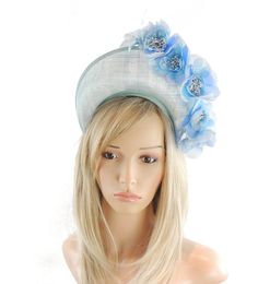 Hats By Cressida Kentucky Derby & Ascot Fascinator Hats Spring Summer Hat & Fascinator Collection Skylar Fascinator Hat Gorgeous silk roses with a halo crown style base Base measures about 8cm high.  Mounted with a matching headband. If you prefer a headband to match your hair, please make a note at check out what colour headband you want. We make each hat to order and can add or change colours just email us with what you need.  We can also make a custom design for you if you have something else Blue Mini Hats With Handmade Flowers For Royal Ascot, Blue Summer Wedding Costume Hats And Headpieces, Blue Costume Hats And Headpieces For Summer Wedding, Summer Blue Headpiece With Handmade Flowers, Light Blue Headpieces For Spring Wedding, Spring Blue Mini Hats With Handmade Flowers, Blue Headpieces For Summer Garden Party, Blue Headpieces For Spring Weddings, Blue Headpiece For Summer Weddings