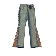 Side Embellished And Beaded Flare Leg Jeans. All Jeans Are Individually Hand Made. Every Piece Is Unique. Flare Leg Has What Feels Like Coated Leather Panels. Raw Released Hem. Cotton Spandex Blend Denim. Size 12. Made In Brazil. 34.5” Inseam 10.5” Rise 14” Waist, Flat Across 13” Hem Opening (Flat Across) Condition: Nwt. New. Beaded Pants, All Jeans, Flare Leg Jeans, Made In Brazil, Cotton Spandex, Flare Jeans, Leg Jeans, Brazil, Hand Made