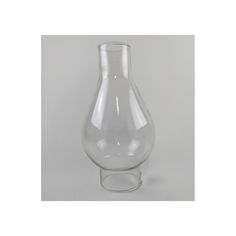 a clear glass vase sitting on top of a table