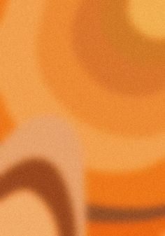 an orange and brown abstract background with circles