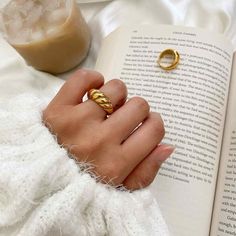 Your perfect statement croissant ring! This ring is lightweight and minimalist in style. Wear it alone for a minimalist look or stack together with other stacking rings. ………………………………….D E T A I L S• Materials: Stainless Steel, 18k gold plating.• Available Size: US 6 (Diameter: 16.5mm), US 7 (Diameter: 17.3mm), US8 (Diameter: 18.2mm)• This product is hypoallergenic, water and tarnish resistant. Pair it with our popular Gold Dome Ring Croissant Earrings, Croissant Ring, Perfect Gift For Girlfriend, Gold Statement Ring, Ringe Gold, Chunky Rings, Twist Ring, 18k Gold Ring, Jewelry Photography