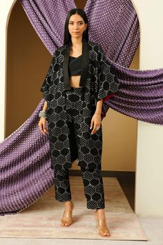 Black Lucknowi cigarette pant in georgette base with hand embroidered mirror work in geometric pattern.
Component: 1
Pattern: Embroidered
Type Of Work: Mirror Work
Fabric: Georgette
Color: Black
Other Details: 
Note: The jacket and crop top worn by the model is not for sale
Occasion: Destination Wedding - Aza Fashions Modern India, Black Overlay, India Style, Pant For Women, Asymmetric Jacket, Geometric Motif, Batik Fashion, Wear Crop Top, Kimono Sleeves