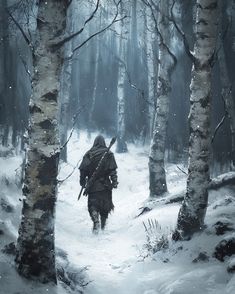 a man walking through the woods in winter