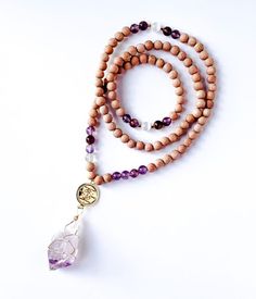 This yoga mala bead necklace features Auralite-23 which is an excellent tool for spiritual healing, inner purification, increases psychic sensitivity, and lucid dreaming. Cheap White Spiritual Beaded Necklace, Spiritual 108 Beads Mala For Yoga, Holistic Hand-strung Mala For Meditation, Spiritual 108 Beads Necklace For Meditation, Spiritual 108 Beaded Jewelry For Yoga, Spiritual Mala With 8mm Beads For Healing, Spiritual Jewelry With 108 Beads For Yoga, Adjustable Spiritual Mala For Yoga, Spiritual Mala With Round Beads For Yoga