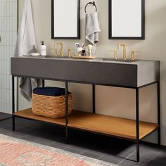 a bathroom with two sinks and mirrors on the wall next to a rug in front of it