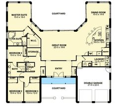 the floor plan for a house with two master suites and an attached garage area, which is