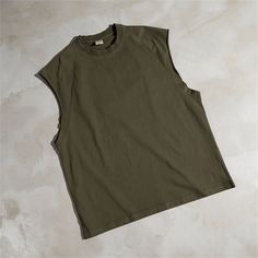 High Street Raglan Sleeveless T-Shirt

Fabric: Cotton

Size: S, M, L, XL, 2XL

Color : White, Black, Army Green, Royalblue, Coffee, Gray, Apricot

Pattern: Solid Color

Type of collar: Round Neck

For the season: Summer

Applicable Scene: Leisure, Daily Solid Color Sleeveless Casual T-shirt, Casual Green Vest Top, Green Cotton Crew Neck Vest, Green Casual Muscle Tee, Casual Green Sleeveless T-shirt, Khaki Cotton Vest Top, Sleeveless Relaxed Fit Tops In Plain Color, Solid Color Relaxed Fit Muscle Tee, Green Cotton Vest Top