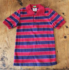 "FRENCH VINTAGE 70's, stunning striped polo top, cotton knit, navy blue and red colors, metallic snap buttons. Brand \" Fracasse \". Size 8 years New old stock I always refund overcharged shipping from 1 Euros overpaid ! Thank you for your visit" Striped Polo Collar Top For Spring, Fitted Polo Shirt With Buttons For Spring, Collared Cotton Polo Shirt For Fall, Fitted Button T-shirt For Fall, Fitted Buttoned T-shirt For Fall, Fitted Tops With Polo Collar And Buttons, Retro Spring Polo Collar Tops, Retro Polo Collar Tops For Fall, Spring Cotton Polo Shirt With Contrast Stripes