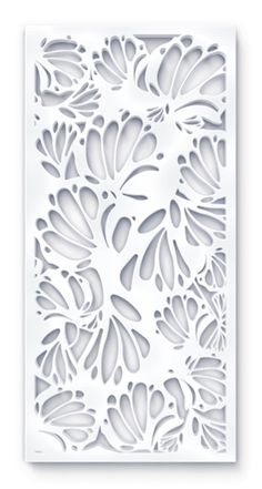 a white paper cutout with an intricate design