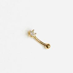 14K solid gold eyebrow bar with a star CZ set. Thickness 1.2mmLength 8mm Material 14K solid gold  and Cubic zirconia Comes in a gift boxMy jewellery is packaged in a sturdy gift box that protects it and makes it easily to store. Online store : www.raw-london.co.ukInstagram: @rawlondonjewelleryEmail me: sales@raw-london.co.ukDo not hesitate to contact me with any doubts, I am happy to help you! Gold Cubic Zirconia Body Jewelry For Gifts, Gold Belly Ring As A Gift, Gold Cubic Zirconia Piercings For Gift, Yellow Gold Internally Threaded Belly Rings As Gift, Gold Celestial Internally Threaded Piercings, Dainty Gold Pierced Body Jewelry, Elegant Gold Star Cartilage Earrings, Gold Dainty Body Jewelry, Gold Celestial Piercings With Internally Threaded Details