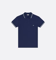 The navy blue polo shirt is adorned with an embroidered hallmark bee on the chest. Crafted in cotton piqué, it has thin contrasting bands on the collar and sleeve cuffs. The polo shirt can be paired with other Dior Essentials creations for a timeless look.. Navy Blue Polo Shirt, Blue Polo Shirt, Bee Embroidery, Blue Polo, Shirt Style, Polo Shirt, Dior, Bee, Navy Blue