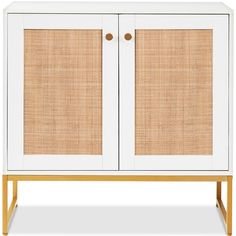 a white cabinet with two doors and wicker panels on the front, against a white background