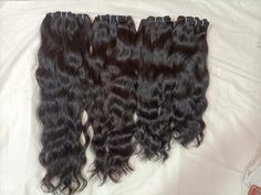 Discover the epitome of natural beauty with Indian Raw Wavy Hair Bundles, sourced directly from reputable Indian hair manufacturers and vendors. Renowned for its unmatched quality and authenticity, raw Indian hair remains unprocessed, ensuring its natural texture and strength are preserved. These luxurious bundles boast a sleek, straight style, perfect for a versatile range of looks. As a wholesale raw hair supplier, Gaurash Beauty Supply caters to the demands of salons, stylists, and discerning Raw Indian Hair, Indian Hair, Raw Hair, Indian Hairstyles, Hair Bundles, Beauty Supply, Natural Texture, Wavy Hair, Hair Extensions