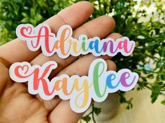 someone is holding three stickers that say,'abrianna kalyfe '