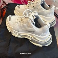 BALENCIAGA Bi-Color Womens Triple S Sneakers Size 38 in White and Metal Grey These sneakers feature a white nylon mesh upper with off-white fabric and light beige rubber soles. Great Condition, little wear! Like New!! Includes dust bag. White Mesh Sneakers For Spring, Trendy White Mesh Sneakers, White Nylon High-top Sneakers, White Nylon Sneakers With Round Toe, Balenciaga Triple S, White Fabric, White Fabrics, Light Beige, Balenciaga