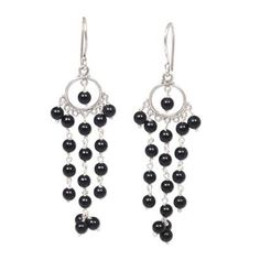 Jet black onyx stones dangle on strands of sterling silver. Designed by artisan Made Sugi these chandelier earrings are an eye-catching accessory and will add an elegant touch to any style. Onyx Chandelier, Black Onyx Jewelry, Silver Chandelier Earrings, Earrings Dangling, Silver Chandelier, Silver Link Bracelet, Women's Blazers, Onyx Jewelry, Black Hills Gold