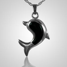 The Dolphine Cremation Jewelry is sterling silver with onyx and crafted by an artistic skilled jeweler one at a time. The quality is excellent and the craftsmanship is outstanding. This Keepsake Pendant holds a small amount of remains, a piece of hair or something that is small enough to memorialize your loved one and bring them close to your heart. Formal Stainless Steel Jewelry With Polished Finish, Symbolic Black Gemstone Jewelry, Engraved Onyx Jewelry As Gift, Oval Black Enamel Jewelry Gift, Engraved Onyx Jewelry For Gifts, Engraved Spiritual Black Jewelry, Engraved Black Spiritual Jewelry, Symbolic Sterling Silver Jewelry With Polished Finish, Black Symbolic Pendant Jewelry