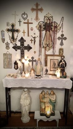 This is my home alter and cross icron wall. Many of my family treasures.. statues, roseries, crosses.. Spiritual Altar Ideas, Home Alter, Vintage Inspired Bedroom, Spiritual Altar, Vintage Rosary, Catholic Decor, Mexican Home Decor, Cross Wall, Home Altar