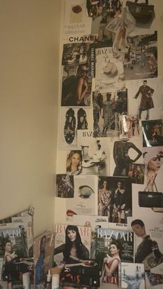 the wall is covered with pictures and magazines