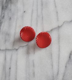 Very retro and fun vibrant red enamel large stud earrings in a seashell pattern.   These have a subtle curve and would add quite a pop.  These do have minor wear to the enamel but still so lovely. In good condition, may have minor signs of wear as all earrings are vintage.  All post back earrings include new stainless steel butterfly backings with purchase. Check out more vintage earrings here: https://www.etsy.com/shop/StyledIvyGems Retro Red Earrings For Gift, Red Enamel Vintage Earrings, Vintage Red Enamel Earrings, Red Seashell, Seashell Pattern, Seashells Patterns, Large Stud Earrings, Earrings Red, Vibrant Red