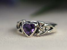 Celtic Knot Leah Heart Created Amethyst Bezel Set Sterling - Etsy Czech Republic Amethyst Heart Cut Promise Ring, Heart Shaped Amethyst Jewelry For Wedding, Heart-shaped Amethyst Wedding Jewelry, Valentine's Day Wedding Amethyst Ring, Purple Gemstone Heart Ring For Wedding, Heart-shaped Purple Amethyst Ring For Wedding, Purple Heart Ring For Wedding On Valentine's Day, Purple Heart Ring For Valentine's Day Wedding, Purple Heart-shaped Promise Jewelry