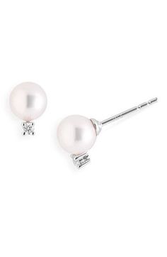 Glittering diamonds accent luminous pearl earrings. 1/4" drop. Post back. Pearl size: 6-6.5mm. Total diamond weight: 0.06ct. Color: G. Clarity: VS2. Grade A+ Akoya cultured pearl/18k white gold/diamonds. By Mikimoto; made in the USA of imported materials. Asian Owned. Evening Pearl Earrings With Brilliant Cut In Diamond White, Timeless Pearl Earrings With Diamond Accents, Timeless Pearl Earrings With Diamond Accents As Gift, White Brilliant Cut Pearl Earrings For Evening, White Single Diamond Earrings For Formal Occasions, Akoya Pearl Earrings With Diamond Accents In Diamond White, White Diamond Pearl Drop Earrings, Diamond White Akoya Pearl Earrings With Diamond Accents, Diamond White Pearl Drop Diamond Earrings