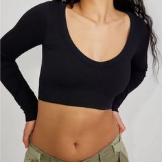 Black Long Sleeve Crop Top, Never Worn Black Seamless Crop Top For Fall, Black Seamless Crop Top For Spring, Black Seamless Tops For Fall, Black Seamless Top For Fall, Trendy Black Seamless Tops, Versatile Black Crop Top, Trendy Black Crop Top With Scoop Neck, Versatile Black Crop Top For Everyday, Black Versatile Crop Top For Everyday