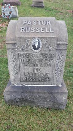 the headstone of pastor russell and his wife