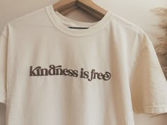 Kindness is free, so spread it like wildfire. Wear this shirt and remind yourself every time you look in the mirror, and remind every person that passes you by! Ivory t-shirt with brown puff vinyl (text is slightly raised) and printed on the front of the shirt. Available in the following unisex sizes: XS, S, M, L, XL, 2XL, 3XL, 4XL Description: 6.1-ounce, 100% ring spun cotton Soft-washed, garment-dyed fabric Double-needle collar Twill-taped neck and shoulders Twill label Double-needle armhole, Kindness Shirt Ideas, Circuit Tshirt Ideas, Shirt Vinyl Ideas, Cricut Tee Shirt Ideas, Circuit Shirt Ideas, Puff Vinyl Shirt Ideas, Be Kind Shirts, Positive Shirts, Be Kind Tshirt