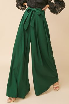 A solid woven pant featuring inverted pleated front, attached self sash tie at side, extra wide leg and size zipper closure Details Self: :95% Polyester, 5% Spandex Size & Fit - Model is 5`8" And Wearing Size Small - Measurements Taken From Size Small - Approx. Length: 46" Waist Tie, Boss Babe, Harem Pants, Wide Leg Pants, Wide Leg, Fitness Models, Spandex, Zipper, Trousers