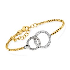 ALOR .17ct t. w. Diamond, Yellow Stainless Steel Two-Circle Bracelet, 14kt Gold. 6". From ALOR, this chic two-circle bracelet sparkles with .17 ct. t. w. diamond rounds in 14kt white gold centered on a yellow stainless steel box chain with a 1" extender. Textured and polished finishes. Lobster clasp, ALOR diamond and yellow stainless steel two-circle bracelet. Diamond birthstones are the perfect gift for April birthdays. Polished Diamond Tennis Bracelet, White Gold Bracelet With Diamond Accents, Flexible Round Diamond Bracelet Fine Jewelry, Fine Jewelry Chain Bracelet With Single Cut Diamonds, Flexible Gold Bracelet In Fine Jewelry Style, Anniversary Yellow Gold Diamond Bracelet, Flexible Round Timeless Diamond Bracelet, Diamond Bracelet With Polished Finish, Timeless Round Flexible Diamond Bracelet