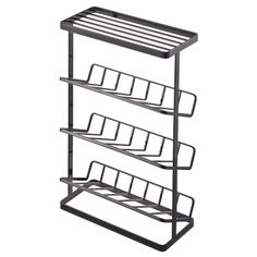 a three tiered metal rack with four compartments on the bottom and one shelf above it