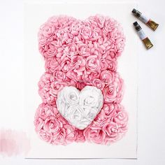 a teddy bear made out of pink roses with a white heart on it's chest