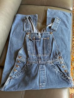 In excellent vintage condition. Labelled small but they are quite petite like an xs.   14 inches across the waist 10 inch rise  17 inch hip 37 inch leg length from the top of the pocket down the outside of the leg Fitted Wide Leg Overalls With Pockets, Utility High Rise Overalls With Pockets, Vintage Full-length Jeans With Side Pockets, Vintage Denim Jumpsuit Overall With Pockets, Vintage Denim Jumpsuit With Pockets, Utility Style Overalls With Belt Loops, Utility Overalls With Belt Loops, Retro Straight Leg Overalls With Pockets, Spring Overalls With Belt Loops