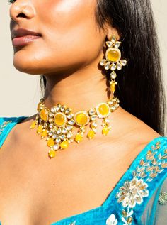 Nayana I - Modern Bride Kundan Bridal Set with Yellow Onyx stone  Indian bridal set makes every bride's outfit perfect. This clear Kundan is further accented with yellow Onyx gems making it one of a kind. Beautiful gemstone drops adorn this set.  This jewelry set is sure to make you stand out from the crowd. This necklace set comes along with a beautiful pair of Jhumka earrings with Kundan and Yellow Onyx to match. Our Bridal collection is handmade with love & care. It makes us super happy to be Yellow Kundan Jewellery, Luxury Yellow Gold Kundan Jhumkas, Yellow Chandbali Jewelry Gift, Temple Jewelry Style Bridal Necklace In Yellow, Yellow Temple Jewelry Bridal Necklace For Festivals, Traditional Yellow Jewelry With Gemstone, Traditional Yellow Gemstone Jewelry, Yellow Kundan Necklace For Wedding, Yellow Kundan Temple Jewelry Necklace As Gift