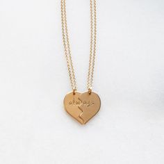 The perfect gift for her, our heart necklace comes in silver and gold options. Keep one half and give one to your sister, mom, daughter or best friend to remind them everyday how special they are! Hand stamped just for you. -Set of two necklaces, each is adorned with a half of the heart.-Complete heart measures 19mm-Choose 14kt gold filled or sterling silver option-Chain and disc are 14kt gold filled or sterling silver - not plated-A high quality chain in your choice of style-Polished to a light Mom Best Friend, Moms Best Friend, Best Friends Sister, Two Necklaces, Special Words, Mom Daughter, Necklaces For Women, Perfect Gift For Her, Gold Filled Jewelry