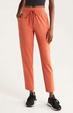 The technical fabric of these surprisingly polished sweatpants is wonderfully smooth and soft to the touch, while the pocket detailing and ankle-length cuffs make them easy to dress up or down. 26" inseam; 12" leg opening; 12" front rise; 16" back rise (size Medium) Elastic/drawstring waist Side hidden-zip pockets 93% polyester, 7% spandex Machine wash, tumble dry Imported Athleisure Joggers For Workwear In Fall, Sporty Solid Color Sweatpants For Workwear, Fall Athleisure Joggers For Workwear, Stretch Straight Joggers For Fall, Fall Stretch Straight Joggers, Fall Stretch Joggers, Fall Season Stretch Straight Joggers, Stretch Joggers For Workwear In Fall, Stretch Ankle-length Joggers