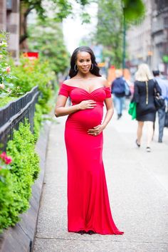 This bright red sweetheart neckline maternity gown will make everyones jaw drop!  Maternity gown. Custom maternity gown. Fall maternity gown. Winter maternity gown. Short sleeve maternity gown. Off the shoulder maternity gown. Sweetheart maternity gown. Pregnancy gown. Pregnant gown. Maternity photo shoot. Couple maternity shoot. Pregnancy photo shoot. Couple photo shoot. Maternity brands. Maternity shoot. Maternity session. Maternity photography. Maternity photoshoot. Maternity style.  #33weeks Fitted Empire Waist Maternity Dress For Wedding, Fitted Floor-length Bridesmaid Maternity Dress, Maternity Fitted Dress With Sweetheart Neckline, Fitted Empire Waist Maternity Maxi Dress, Maternity Gown With Sweetheart Neckline, Fitted Maternity Dress With Sweetheart Neckline, Fitted Floor-length Maternity Gown, Maternity Fitted Gown With Sweetheart Neckline, Fitted Maternity Gown With Sweetheart Neckline