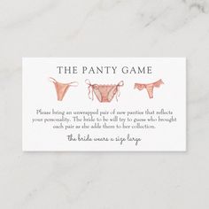 a business card with two bras on it and the text, the fancy game