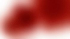 a blurry image of red and white colors