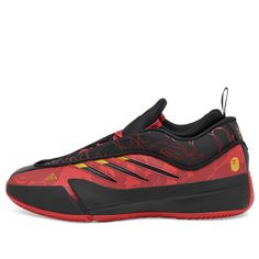 the adidas basketball shoe is red and black with yellow accents on the upper part