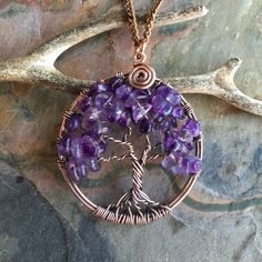 This is the Amethyst gemstone tree of life pendant in antiqued copper wires We handmade this wire wrapped Tree of Life pendant necklace made with Amethyst gemstone using genuine copper wires in various gauges, then I used the antiquing process to darken/patina the copper wires and then polished to give that warm & rich look of the finished tree of life. *Perfect for February Birthday Gift. ~~The pendant measures about 1.70 inch in diameter without the bail. It comes on an antiqued copper fin Spiritual Purple Copper Necklace, Hand Wrapped Purple Copper Necklace, Purple Wire Wrapped Copper Wire Necklace, Wire Wrapped Tree Of Life, Wire Wrapped Tree, Gemstone Tree, February Birthday Gifts, Wire Trees, Necklace Amethyst